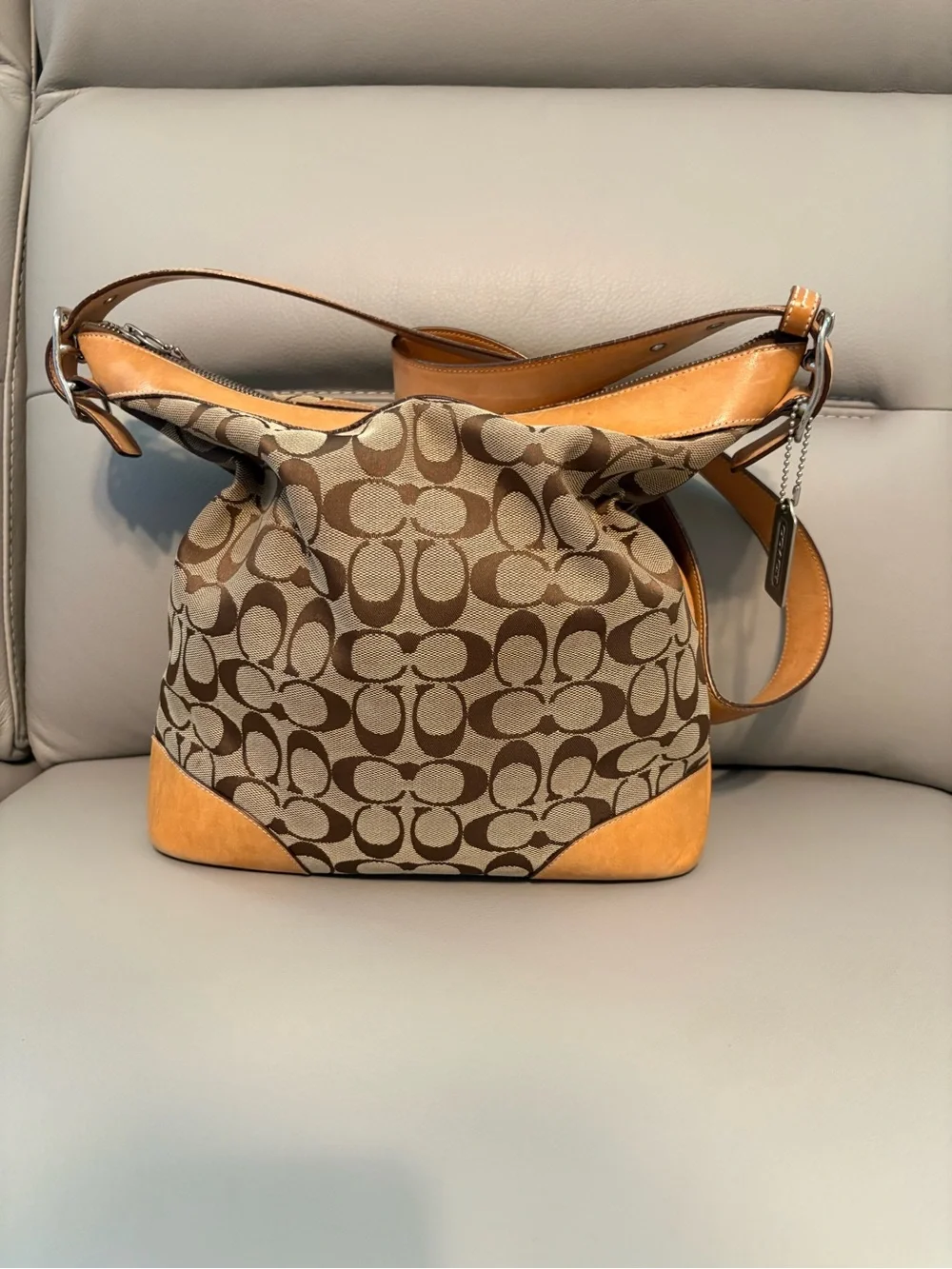 Coach Signature Canvas Shoulder Bag/Crossbody Hobo bag in Brown and Tan